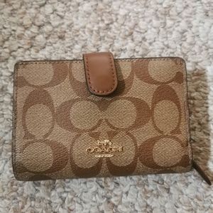 SOLD Coach signature khaki bifold wallet